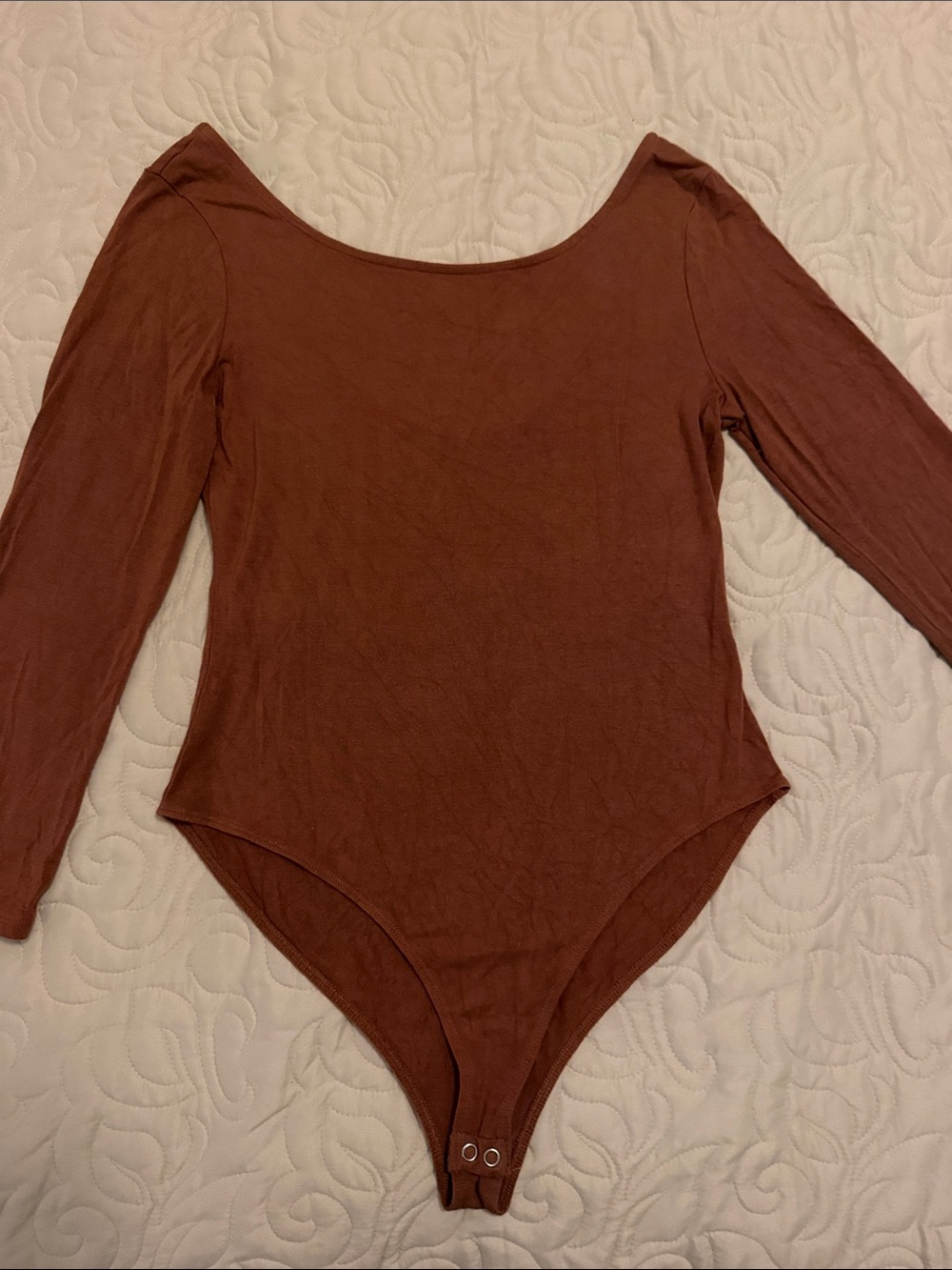 Woman’s Long Sleeve One-Piece Bodysuit in Rust